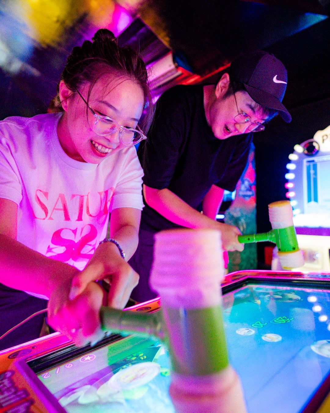 Guests at an arcade smashing game