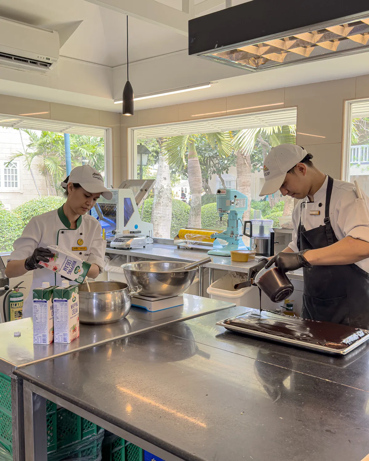 Two chefs at work in the pastry kitchen