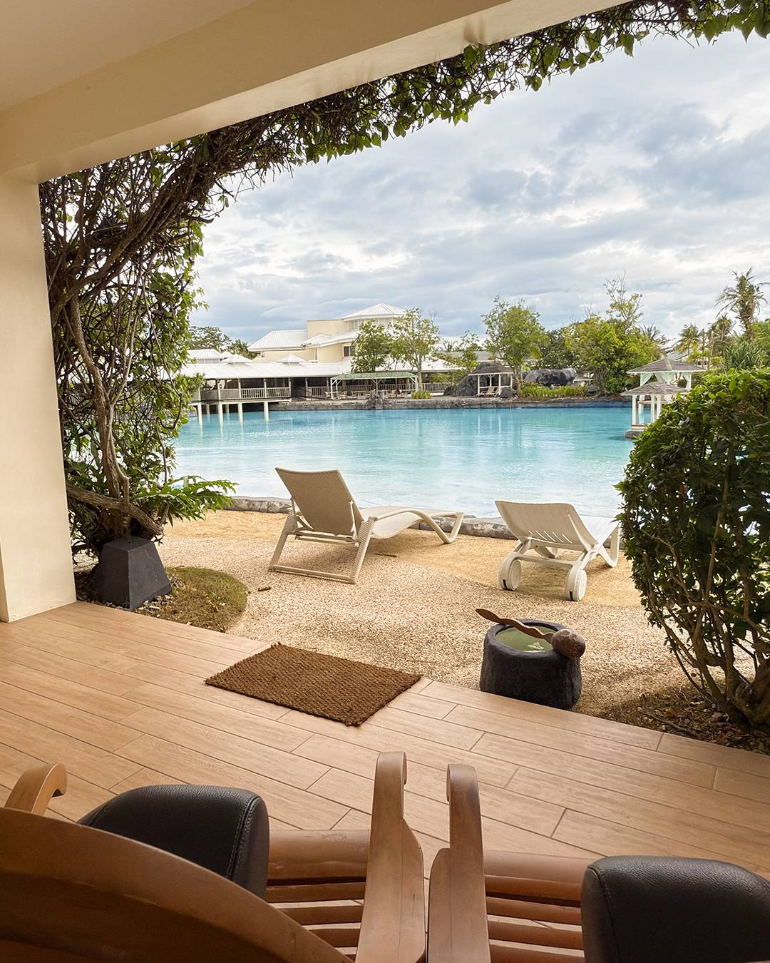 Balcony with the beach and butaka chairs