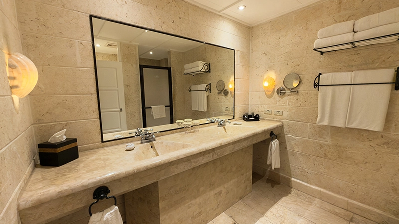 Smoking-Permitted Room bathroom with long double-sink marble vanity